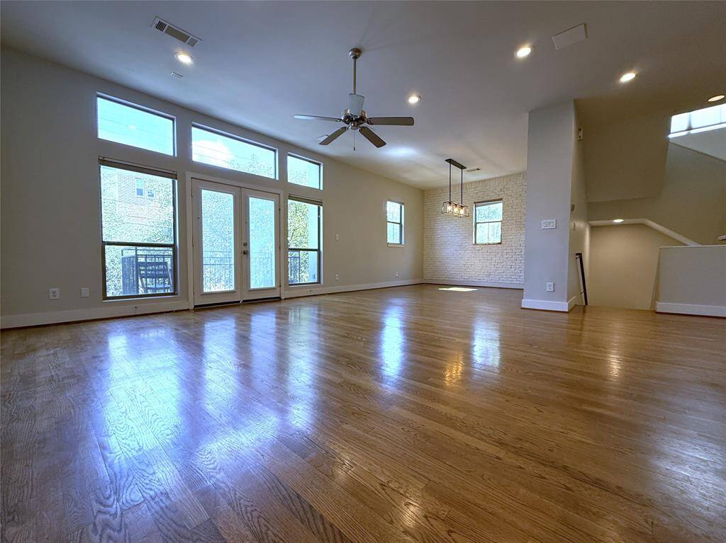 From the kitchen, alternate view of the living/dining space.