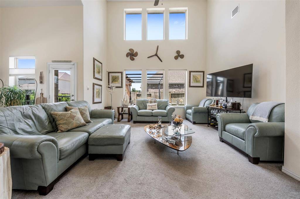 Just off the kitchen is your living area. Spacious and inviting living area.