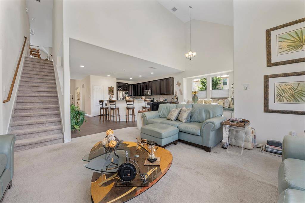 Hidden staircase - not visible from the front door.  Located at living room.