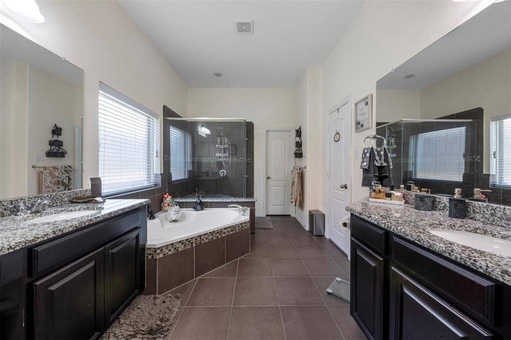 Off to view the principal ensuite.  His and hers vanities.
