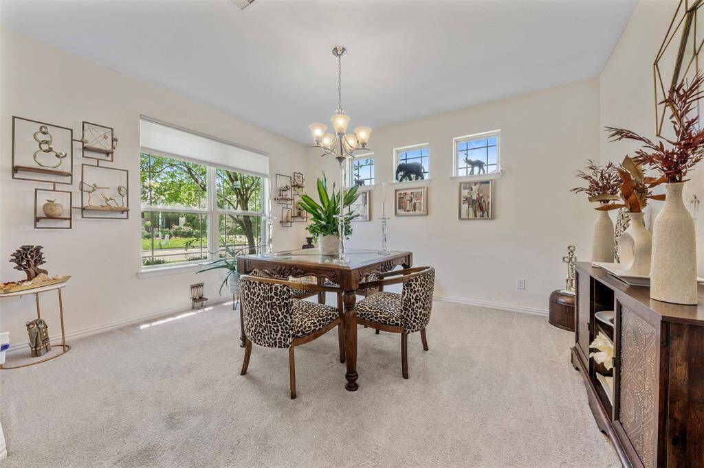 Your view upon entry - the formal dining area - look at how spacious and the light flows. Could be a downstairs office.
