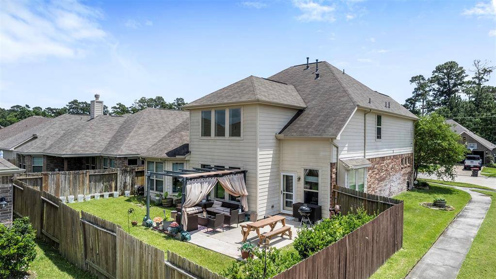 Aerial rear view of the corner home in Kings Mill.