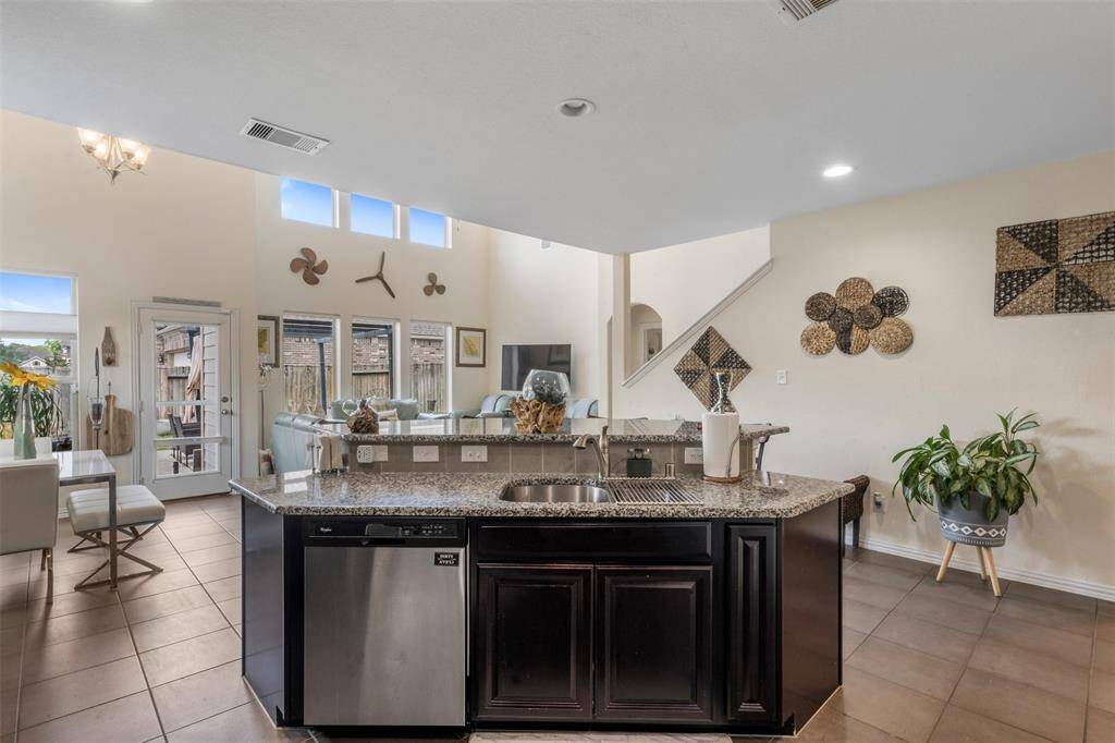 Island kitchen sink and view of the your breakfast area - this kitchen makes entertaining a breeze.