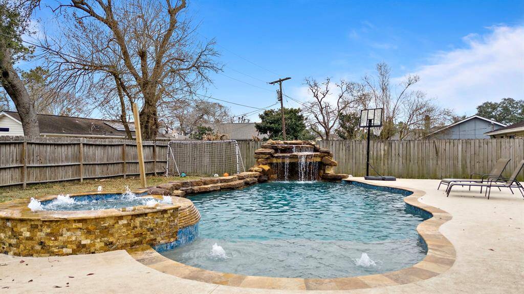 Dive into luxury with a stunning pool and spa, ideal for relaxing in the Texas heat!