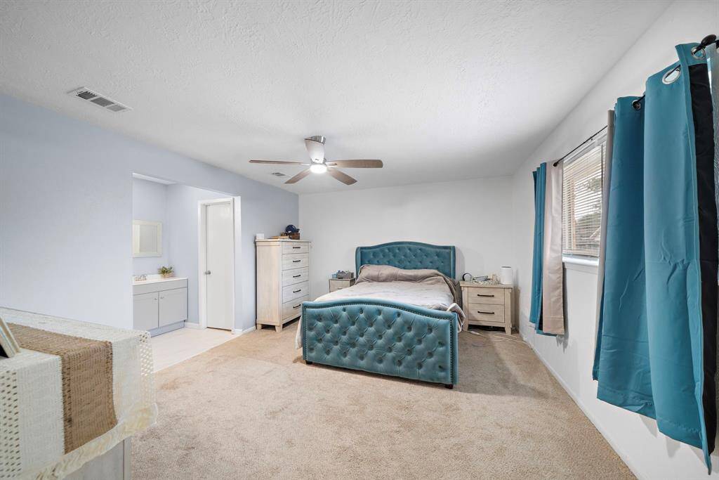 Expansive primary suite with a private ensuite bathroom.