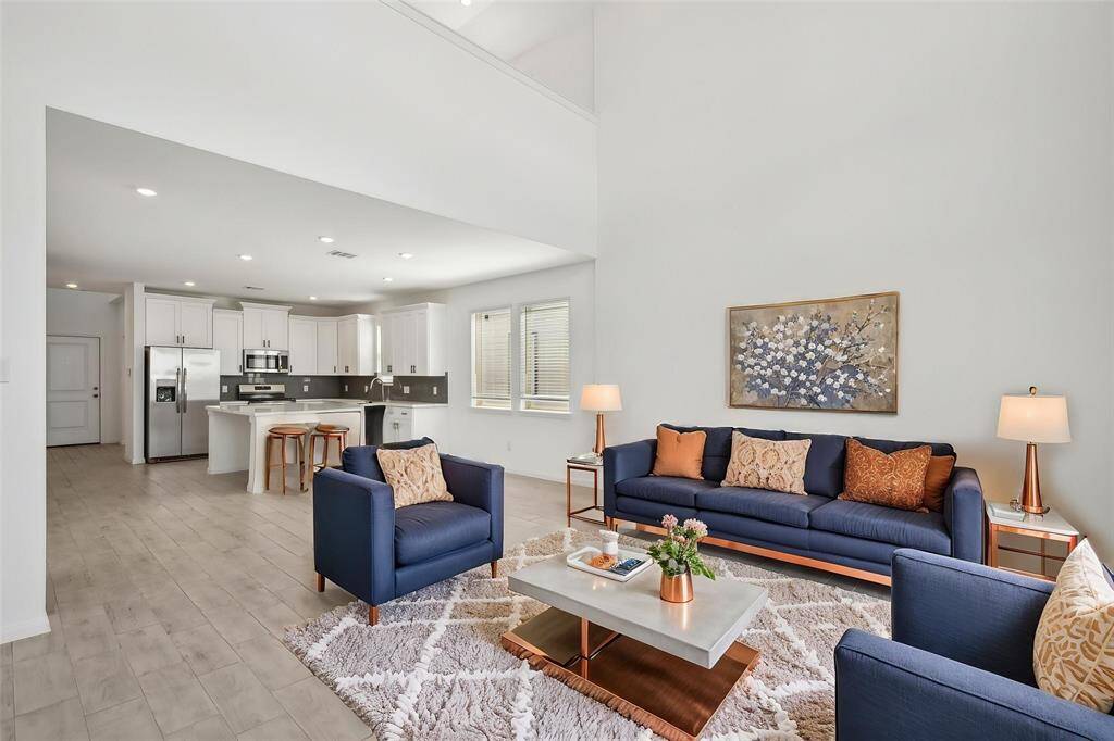 Imagine relaxing in this stylish and inviting area, perfect for both everyday living and entertaining.