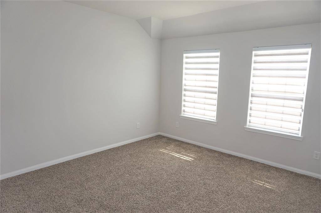 Primary Bedroom featuring ample natural light!