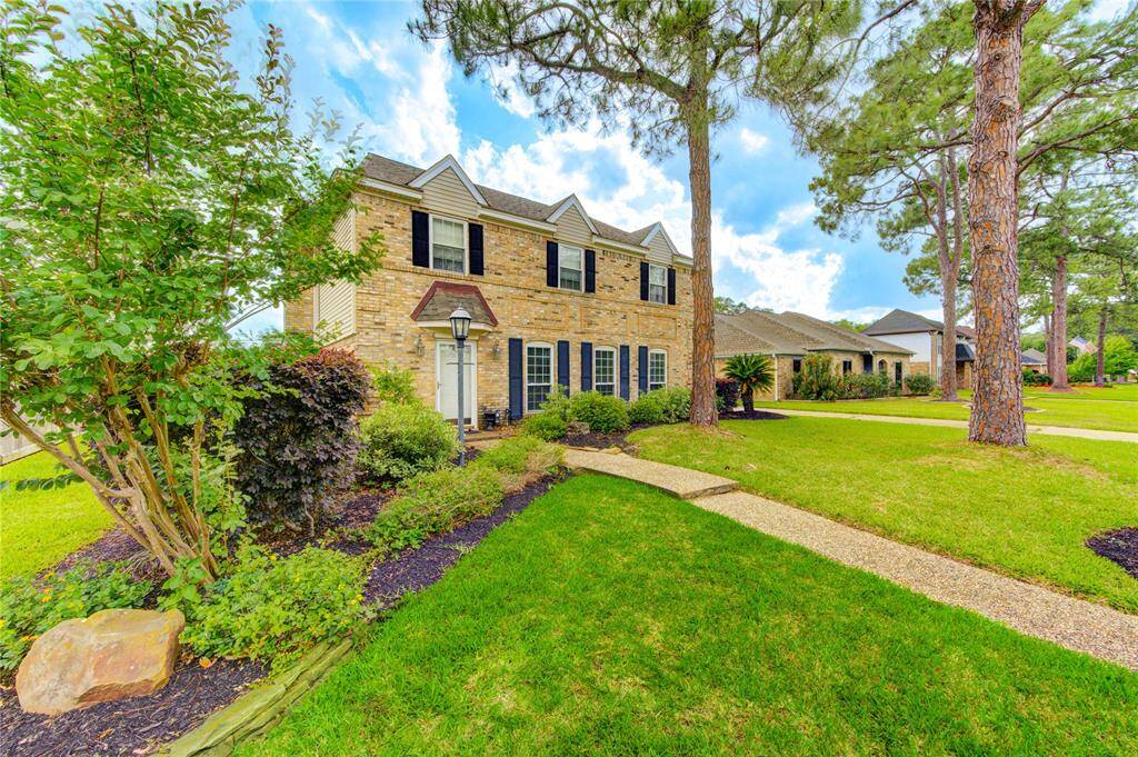 A charming elevation on this two story brick home with classic curb appeal
