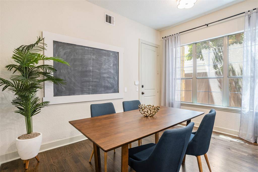 Bright and welcoming, the breakfast nook offers the perfect spot to start your day with views of the front garden path. With easy access to the garage and just steps from the kitchen, it’s a charming space that blends everyday convenience with natural light and comfort.