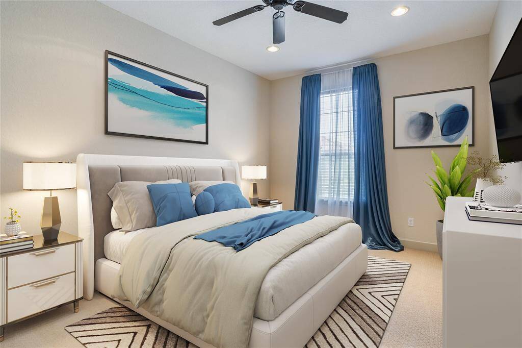 Virtually staged to showcase its potential, this spacious bedroom is one of three and offers plush carpeting, a ceiling fan, and abundant natural light. Whether used as a guest suite, nursery, or personal retreat, the space is flexible and ready to suit your lifestyle.