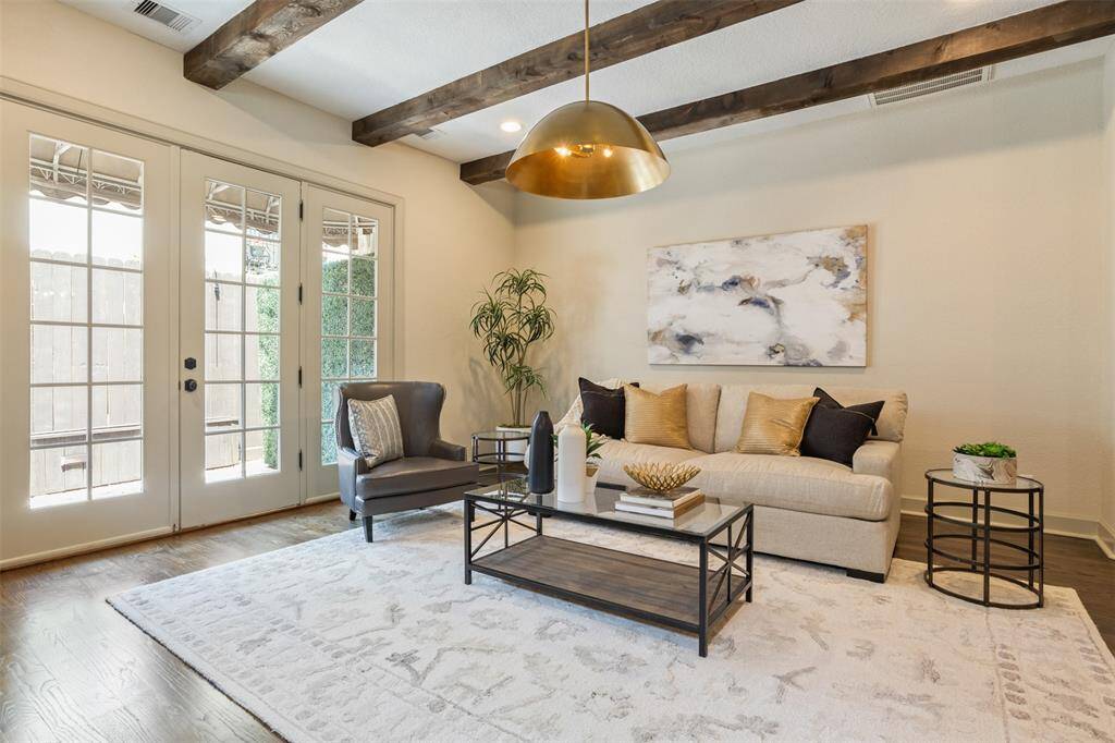 Clean lines, warm textures, and soft natural light create a perfectly balanced living space. Thoughtfully styled and beautifully open, this room feels both elevated and effortlessly livable.