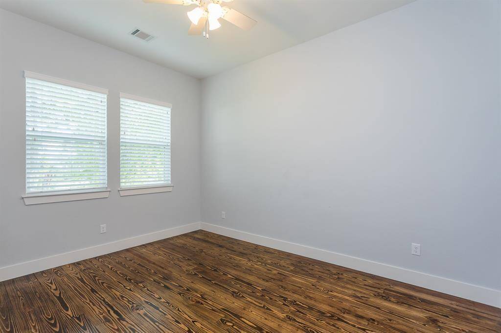 First floor bedroom with attached bath could also be used as an office. Attached double-door closet and full bath attached. Across the hall, large walk-in storage closet as well.