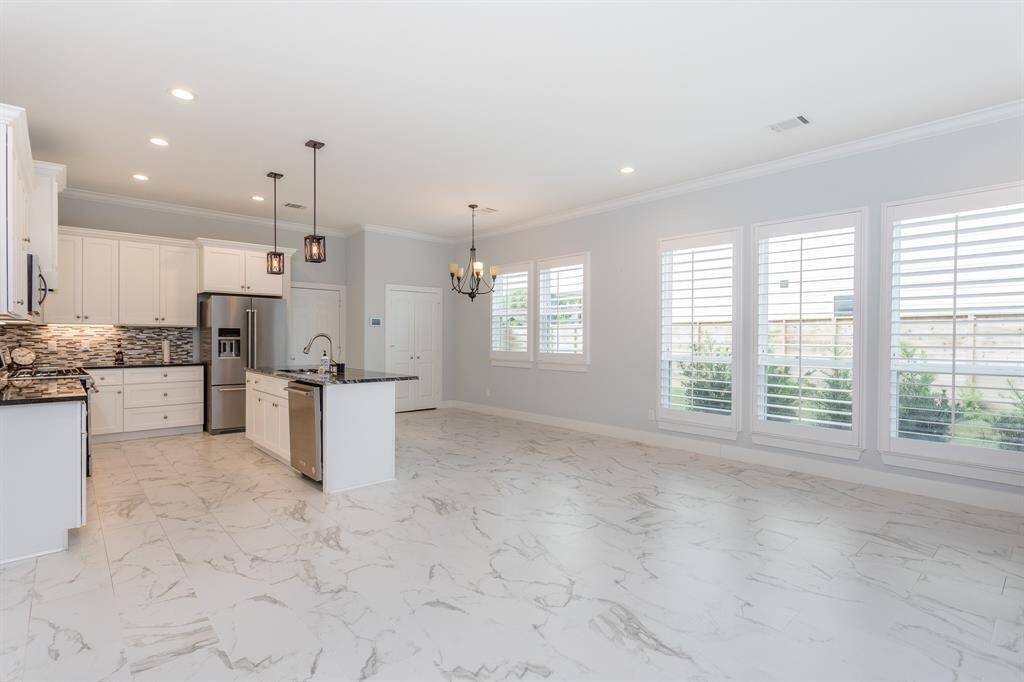 Plenty of natural lighting surrounds this area as well, which really makes it unique along with the custom-fit shutters. Hi tech security system pre-installed.*Tenant occupied until 05/31.*