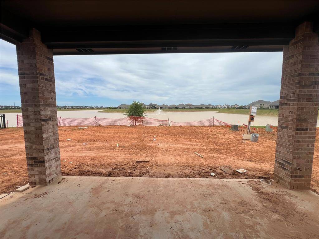 Picture expansive windows that invite natural light to dance through spacious living areas, creating a welcoming atmosphere perfect for gatherings or quiet moments of reflection