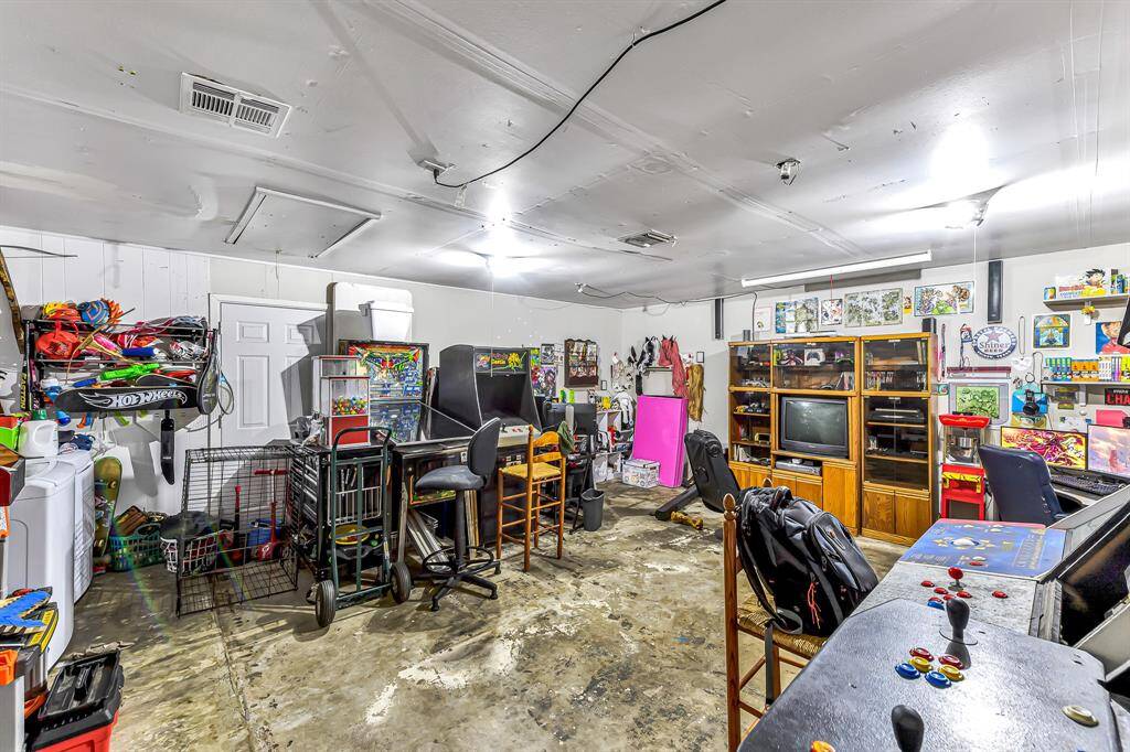 garage coverted to bonus room / hobby room / home gym / mancave / home theatre