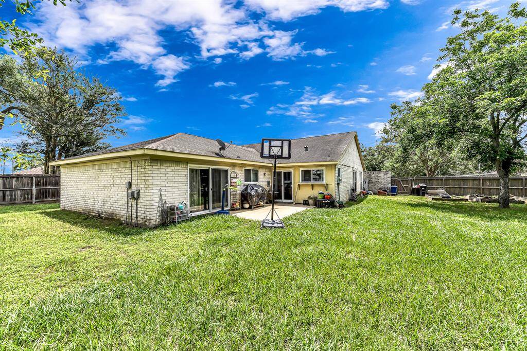 large back yard with patio