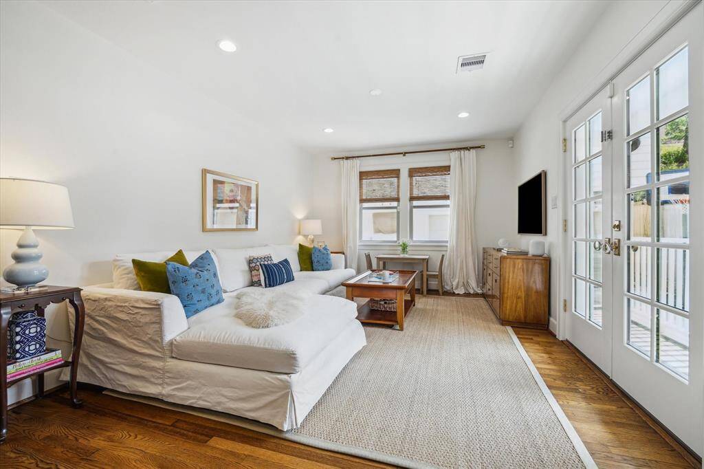 Lovely Den at the southwest side of the home with access to the backyard.