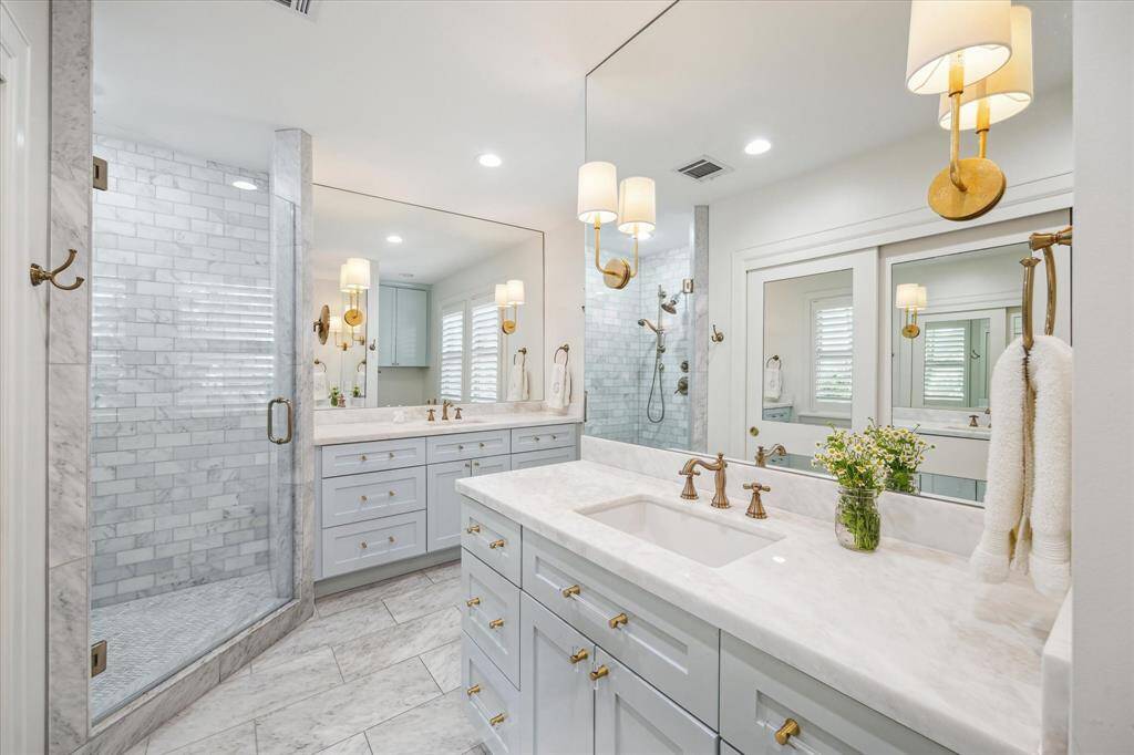 Double vanities and an impressive shower.