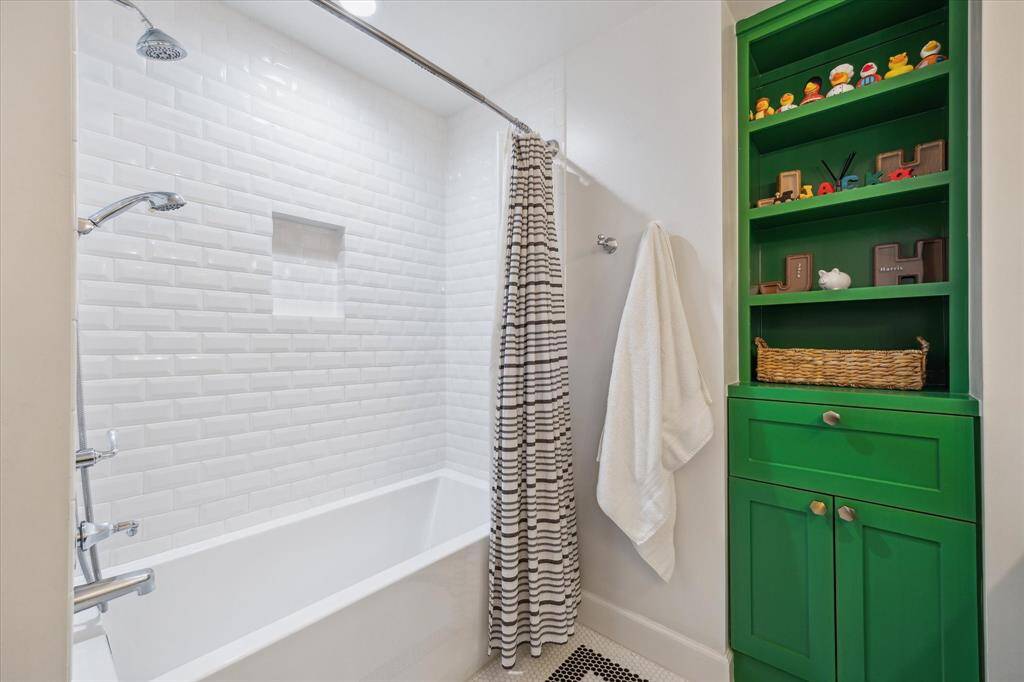 Another view of the Upstairs bath with built-in storage