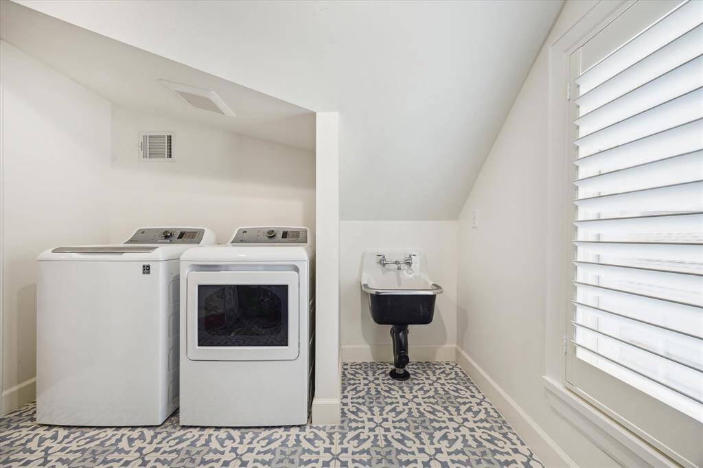 Upstairs utility room with  sink.