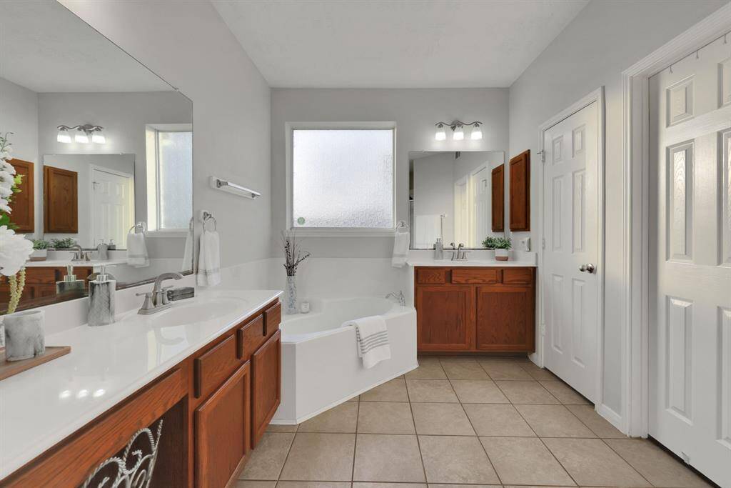Check out the separate soaking tub in the corner