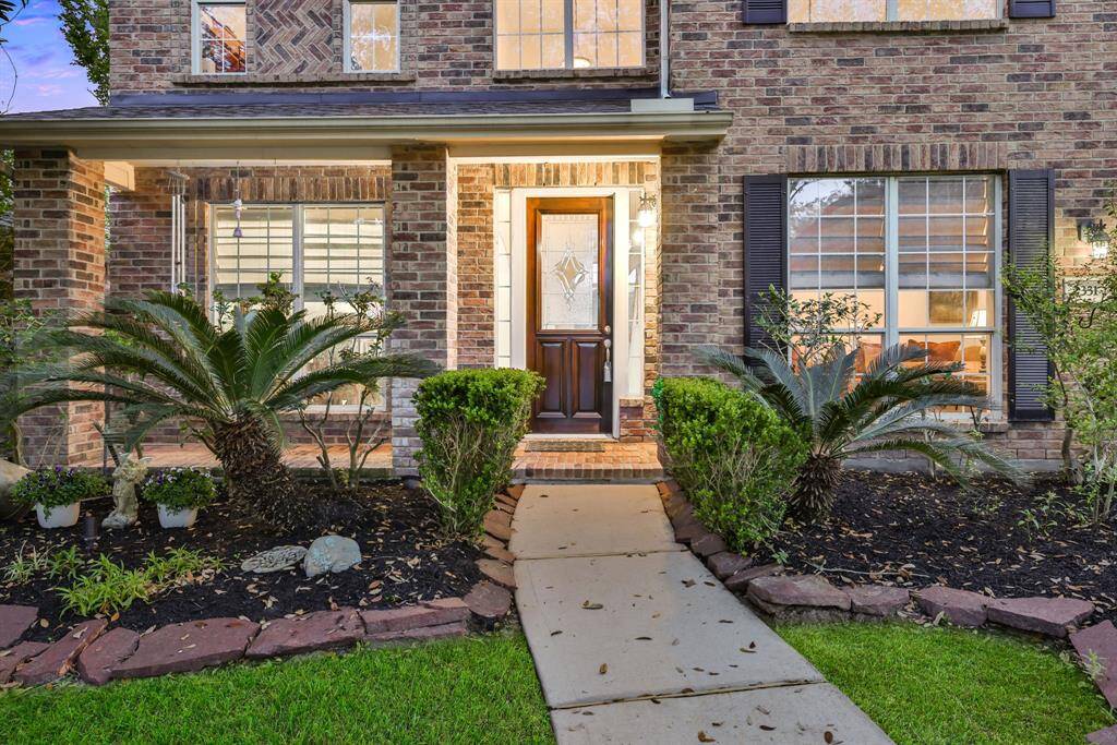 Step onto your private covered front patio/entry