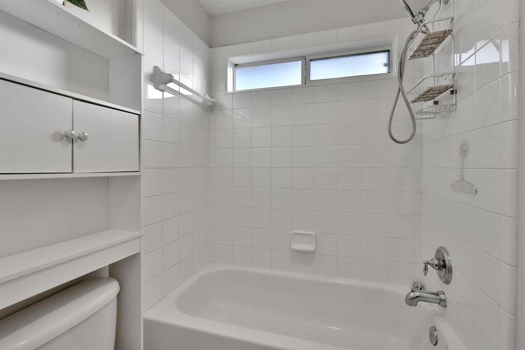 Secondary bath at the top of the stairs