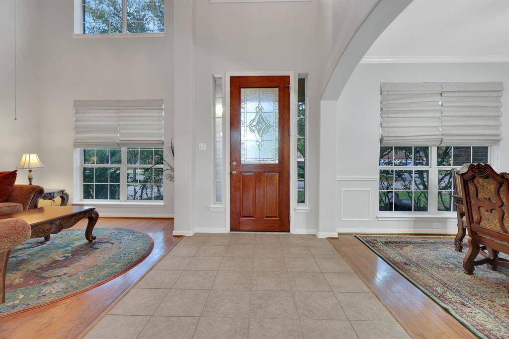 View toward the front door w/dining and flex space