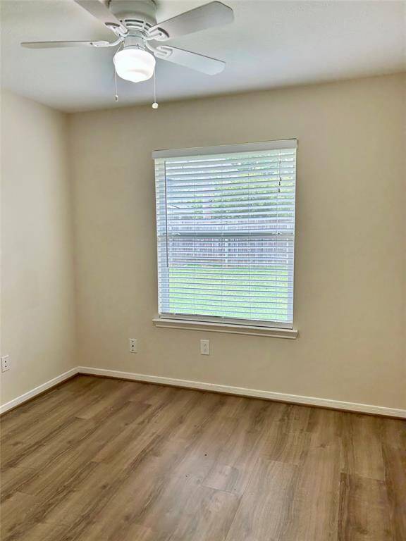 Study/game/exercise/storage room with window facing backyard, your choice!