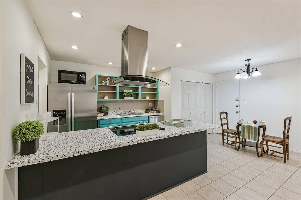 Kitchen has easy access to serve family and guests