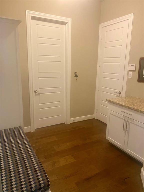 View of spacious entry from 3-car garage.