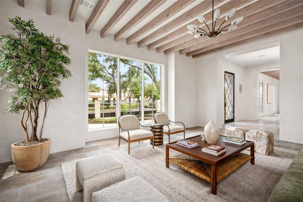 No attention to detail was spared from the antique Itlaian 10-light chandelier, state of the art lighting and views of the front yard