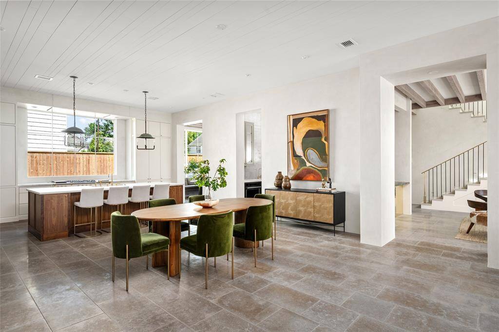 The Fabulous Kitchen has much to offer and can be utilized in many ways....11' ceiling, European limestone flooring, glazed random plank ceiling with recessed lighting and tons of natural light