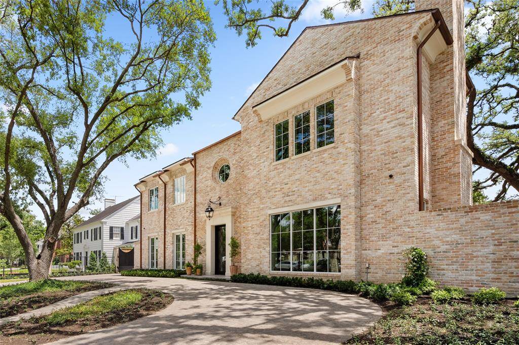 A circular gated front driveway is always a coveted asset along with a charming side ribbon gated driveway leading to the generous 3 car garage with maneuver space.