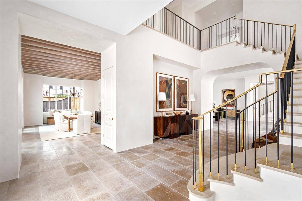 The Front Entry provides generous wall space for the art lover/collector and a dedicated coat closet to welcome visitors and guests