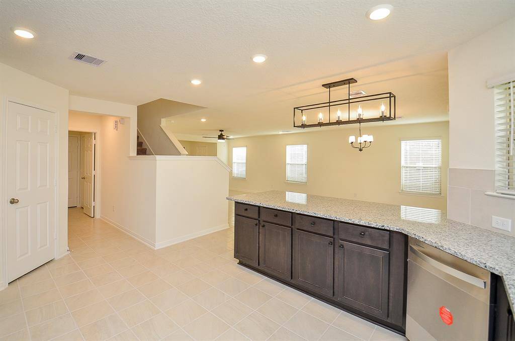 Spacious walk-in pantry for convenient storage.