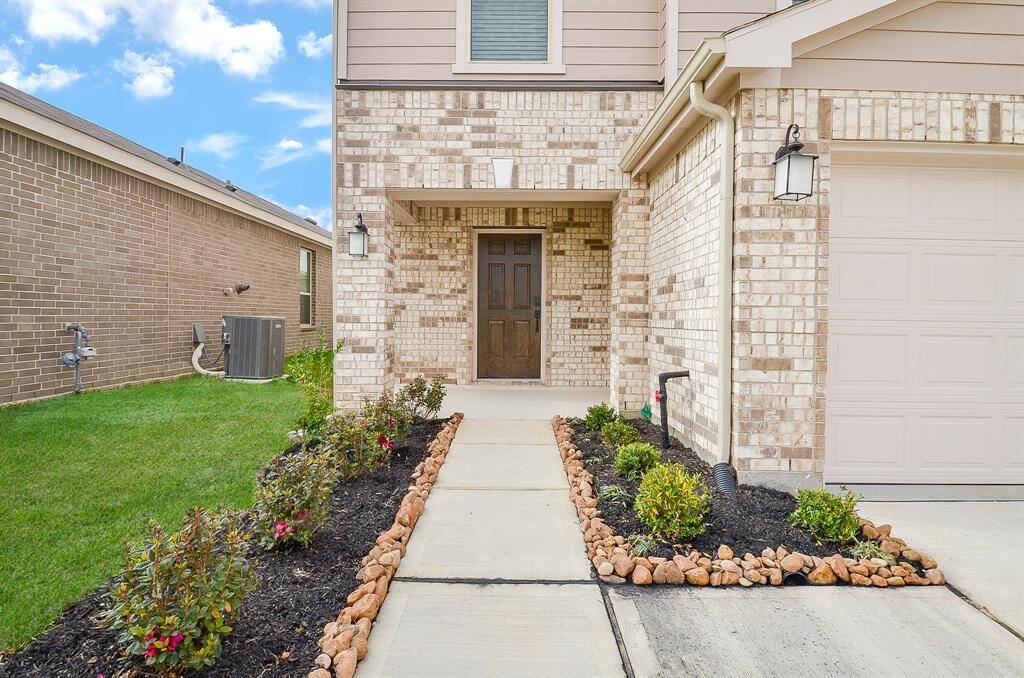 Welcome to a charming entryway that sets the tone for this inviting home.