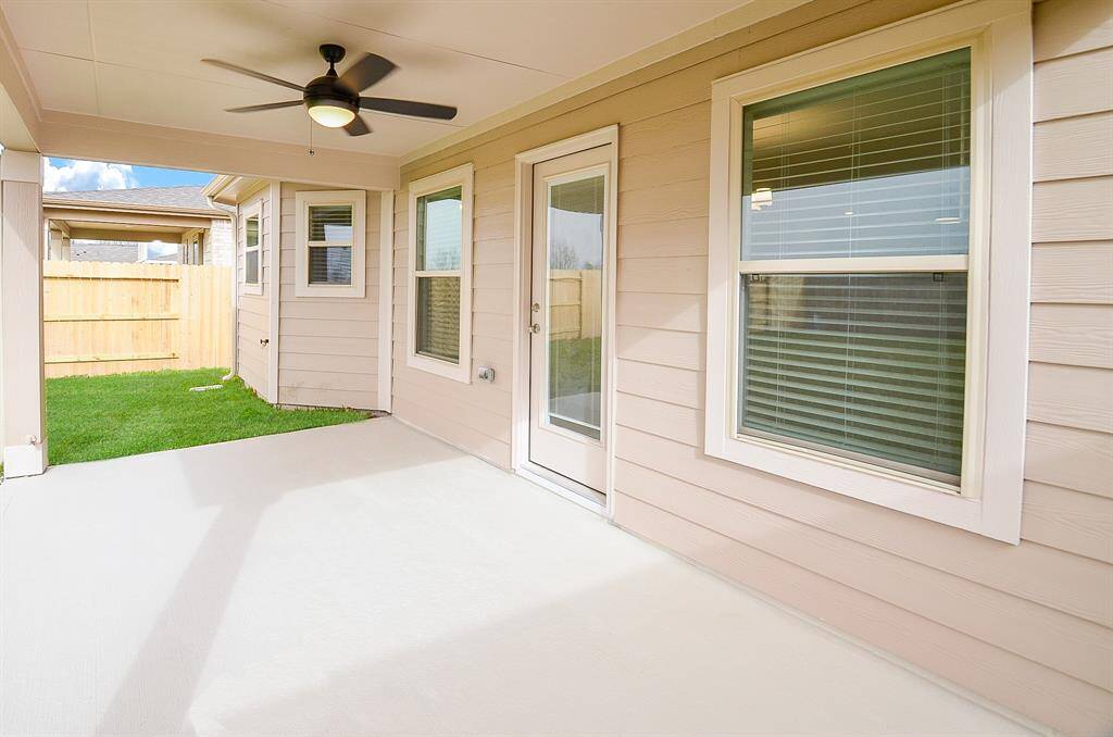 Spacious covered patio perfect for outdoor enjoyment.