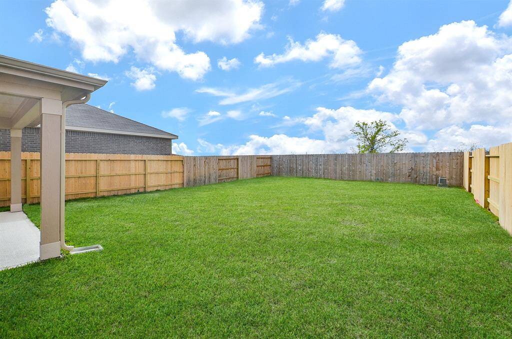 Enjoy a generous backyard perfect for relaxation and entertaining.
