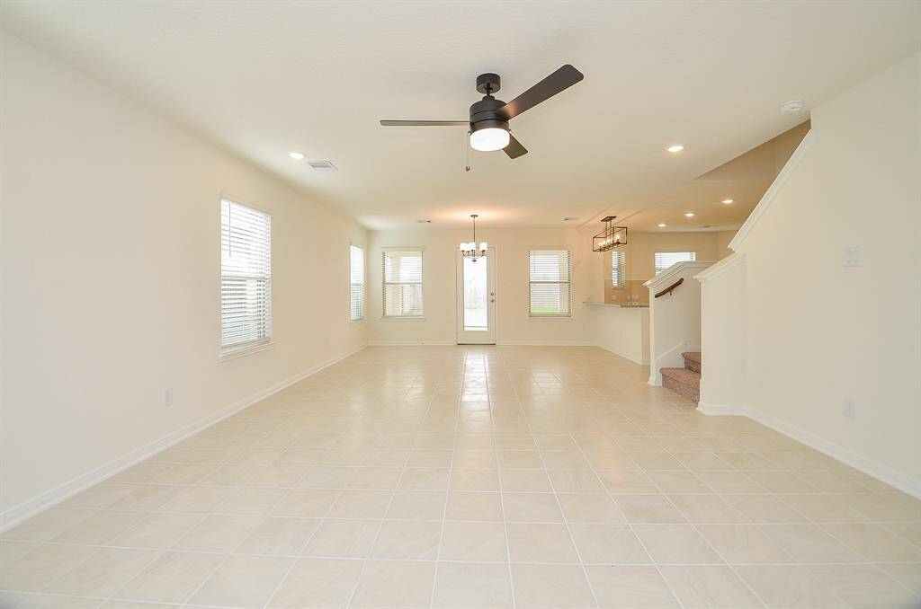 Bright and spacious living room with abundant natural light.