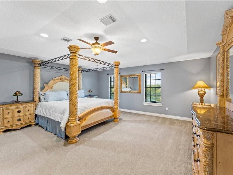 Primary bedroom with loads of space, facing the front of the property.