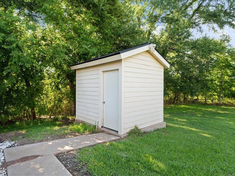 The pool pump storage shed.