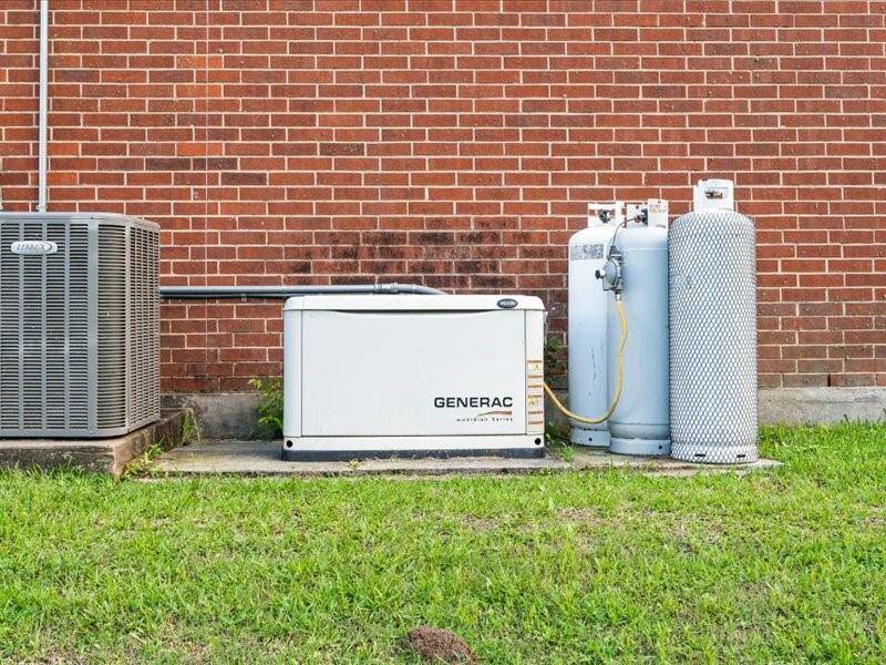 The Generac backup generator with 1 propane tank, for reliable power and climate control options for the home.