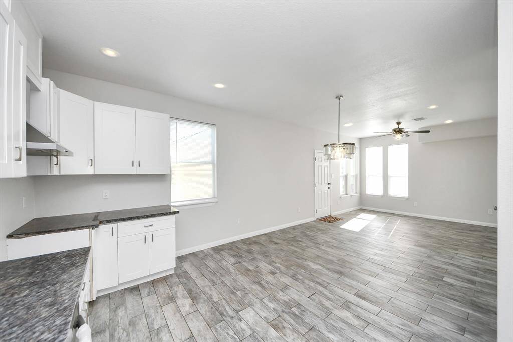 The heart of the home, this kitchen is a chef's delight. Modern appliances, ample storage space, and a convenient center island make meal preparation a breeze. Imagine the joy of gathering around the dining table, creating lasting memories with family and friends.