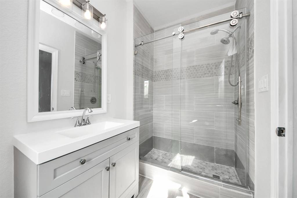 Fiberglass walk-in shower.