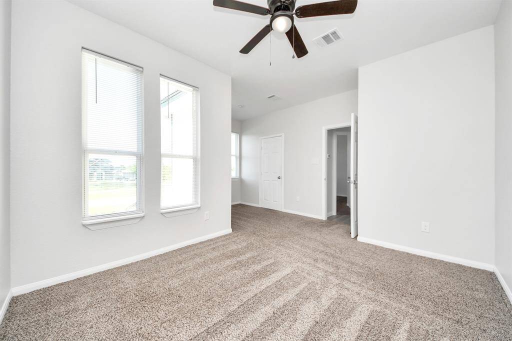 This versatile bedroom is a canvas awaiting your personal touch. With its generous size and abundant natural light, it presents endless possibilities as a home office, playroom, or an additional cozy retreat for guests.