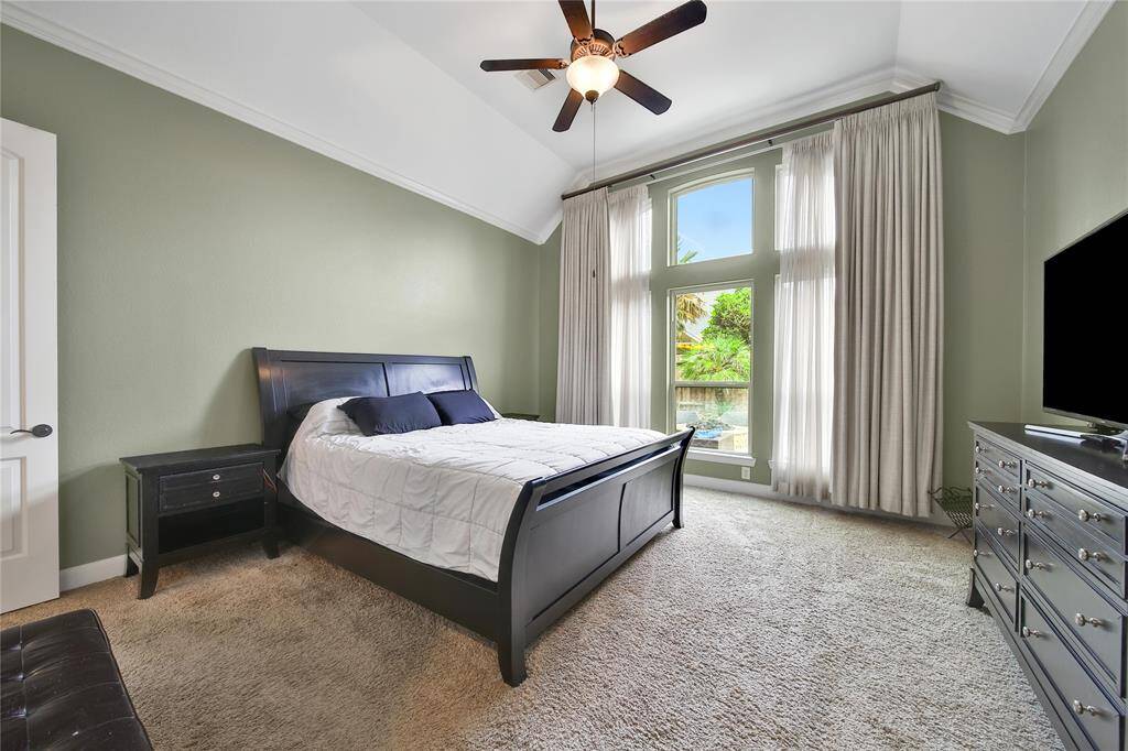 Primary bedroom with a view of the pool!