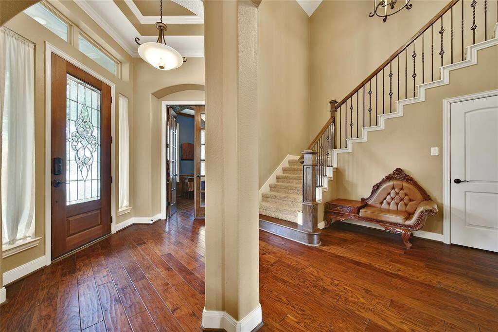 Rich wood floors invite you in!