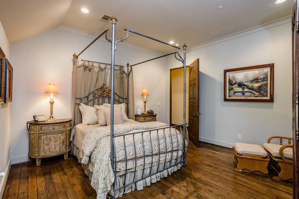 One of three second floor private bedrooms with en-suite full bath.  White oak hardwood floors.  Recessed lighting.