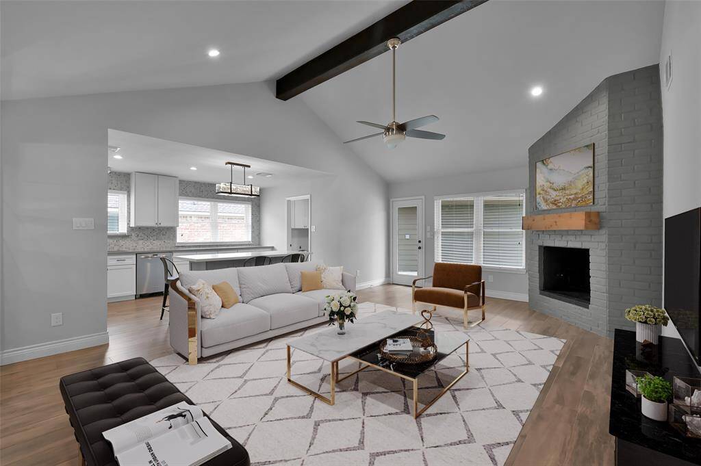 Family room opens to the kitchen and offers great space for entertaining! *photo is virtually staged.